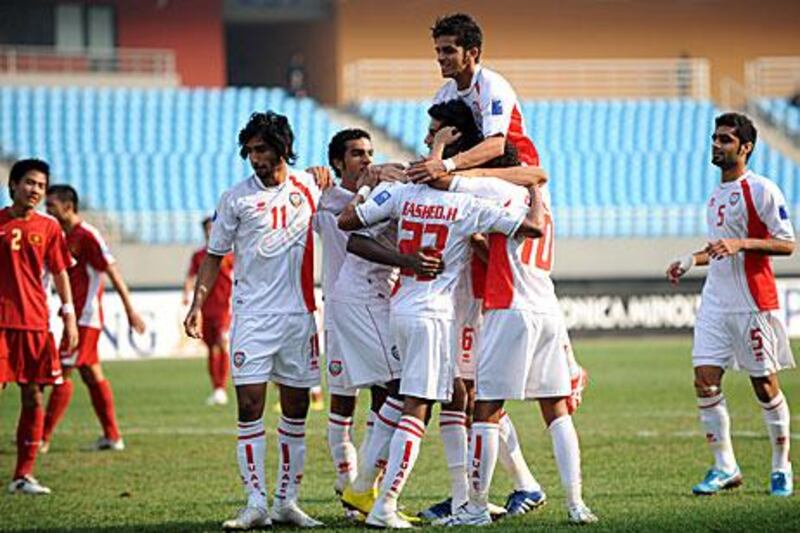 The UAE Under 19 team celebrate one of their four goals against Vietnam.
