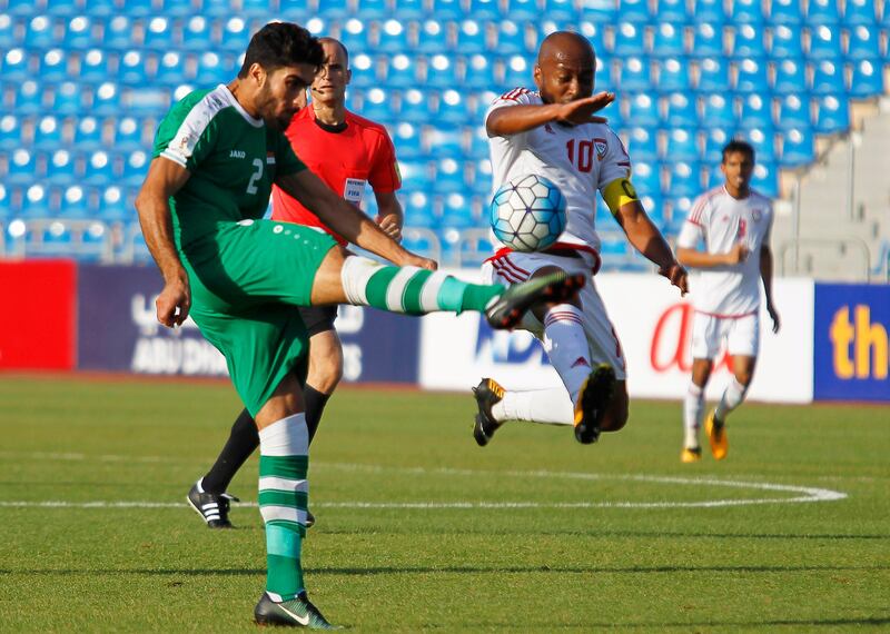 epa06185680 Iraq's Ahmed Ibrahim (L) in action against Ismaeil Matar (R) of the UAE during the FIFA World Cup 2018 qualifying soccer match between Iraq and the United Arab Emirates at the Amman International Stadium in Amman, Jordan, 05 September 2017.  EPA/AHMAD ABDO