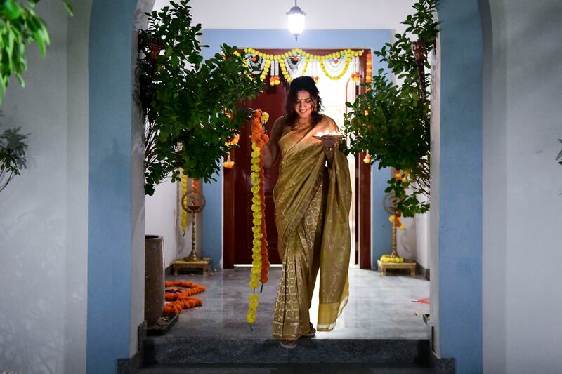 Prgati Grover prepares for the Diwali celebration at her home in Dubai. Khushnum Bhandari / The National