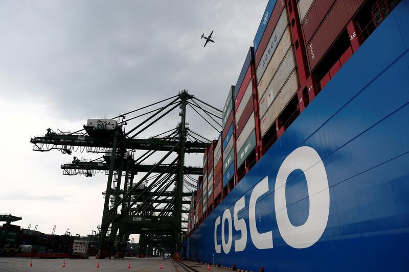 FILE PHOTO: A Cosco Shipping vessel is moored at PSA's Pasir Panjang container terminal in Singapore September 19, 2018.  REUTERS/Edgar Su/File Photo