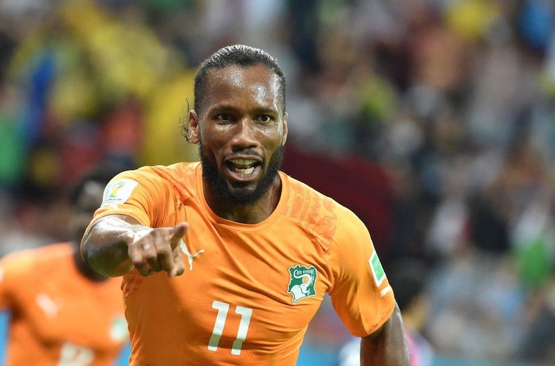 Captain Didier Drogba celebrates after Ivory Coast's forward Gervinho scored the winning goal against Japan in their Group C opener in Recife.  Issouf Sanogo / AFP Photo

