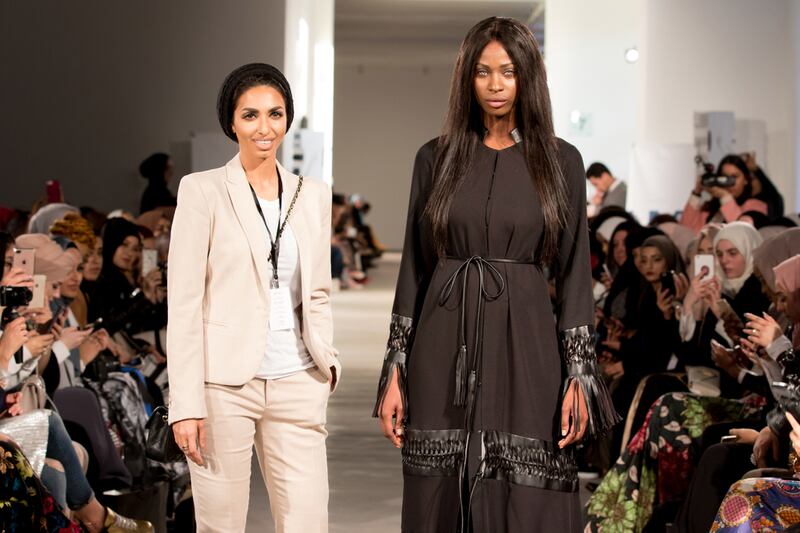 Emirati designer Sara Al Madani, left, opened London Modest Fashion Week on Saturday with her leather-adorned abayas. Courtesy Nimz Chana.