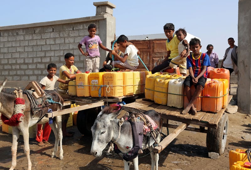 A lack of water in Yemen in nothing new. Here, Yemeni children fill jerry cans with water from a donated source on the outskirts of the port city of Hodeidah in 2016. AFP