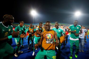 Sadio Mane, centre, has the chance to create Senegalese football history when he leads his national team into the Africa Cup of Nations final. Reuters