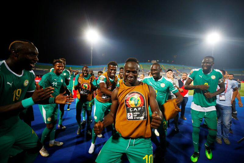 Soccer Football - Africa Cup of Nations 2019 - Semi-Final - Senegal v Tunisia - 30 June Stadium, Cairo, Egypt - July 14, 2019  Senegal's Sadio Mane and teammates celebrate after the match   REUTERS/Mohamed Abd El Ghany