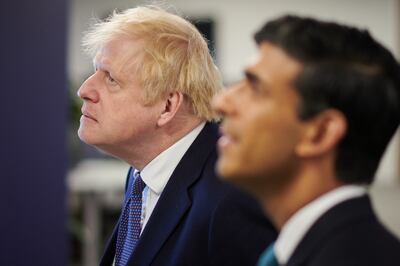 Then UK prime minister Boris Johnson with then chancellor Rishi Sunak at the headquarters of Octopus Energy in October 2020 in London. Getty Images