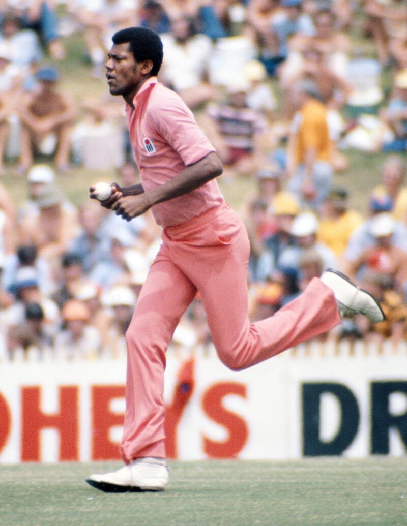 SYDNEY, AUSTRALIA - NOVEMBER 28: Colin Croft of WSC West Indies bowling in Pink clothing during the 1st One Day International of the World Series Cricket International Cup between WSC Australia and WSC West Indies, the first match in which the players wore coloured clothing, at the Sydney Cricket Ground, Sydney, Australia, 28th November 1978.  (Photo by Allsport/Getty Images/Hulton Archive)