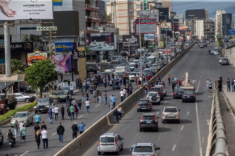 A view shows supporters of Lebanese Christians parties closed the Northern Highway during a protest against the collapsing Lebanese pound currency and the price hikes of goods, in Al-Zouk area, northern Beirut, Lebanon.  EPA