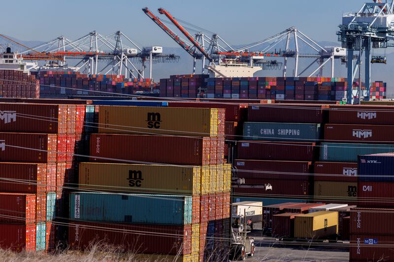 Ships unload their cargo at the Port of Los Angeles in the US. International cargo and container shipping is responsible for three per cent of global greenhouse gas emissions. Reuters