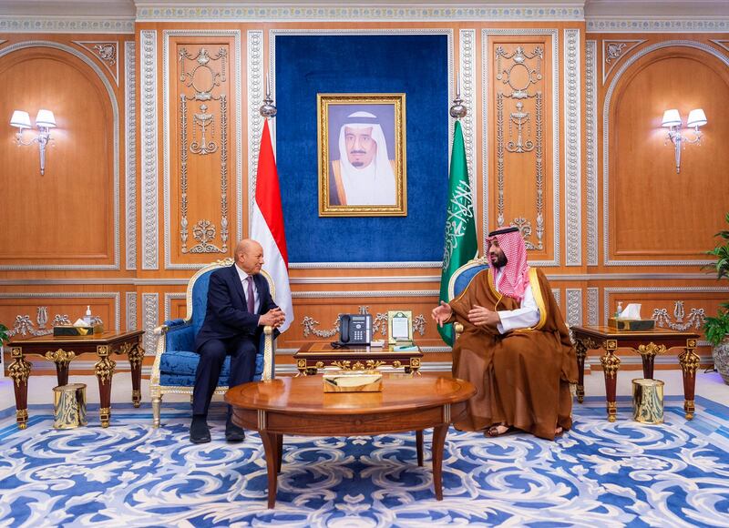 This handout image released by the Saudi press Agency (SPA) on April 7, 2022, shows Saudi Crown Prince Mohammed bin Salman (R) meeting with Rashad Al Alimi, head of Yemen's Presidential Leadership Council (PLC).  SPA