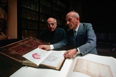 Scholars at the Biblioteca Ambrosiana in Milan, Italy examine geometric designs in the Codex Atlanticus of Leonardo da Vinci. Getty Images