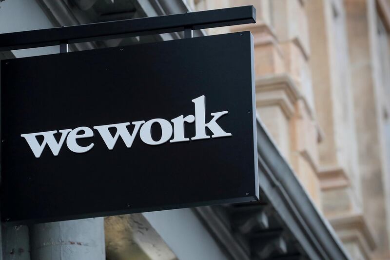 FILE PHOTO: The WeWork logo is displayed outside of a co-working space in New York City, New York U.S., January 8, 2019. REUTERS/Brendan McDermid/File Photo