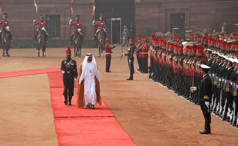 Sheikh Mohammed bin Zayed, Crown Prince of Abu Dhabi and Deputy Supreme Commander of the Armed Forces, inspects a guard of honour during a ceremonial reception at the Presidential Palace in New Delhi, India, on Wednesday. Manish Swarup / AP Photo