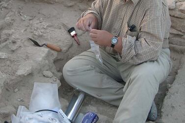 Dr Mark Beech excavating on Marawah Island in 2004. Courtesy Richard Cuttler