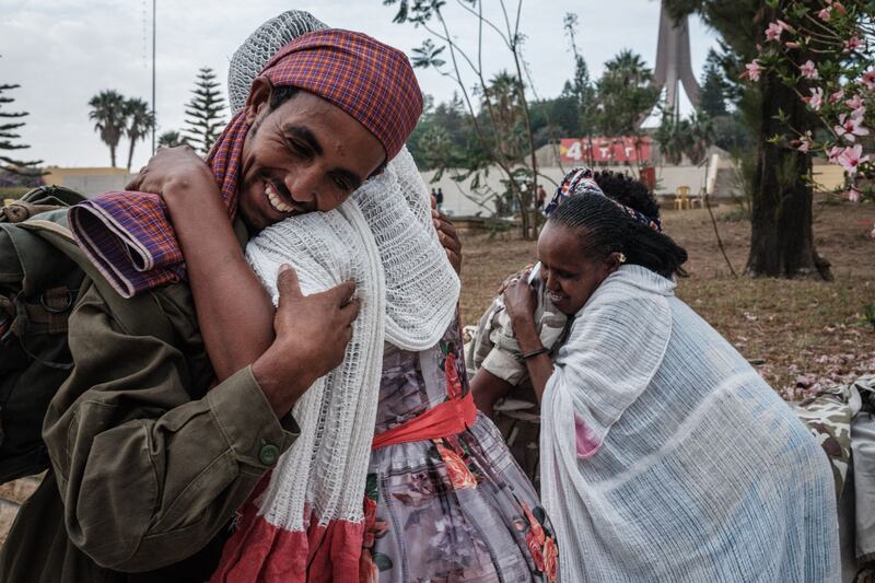 Women welcome soldiers of Tigray Defence Force (TDF) as they arrive after eight hours walking at Tigray Martyr's Memorial Monument Centre in Mekelle.