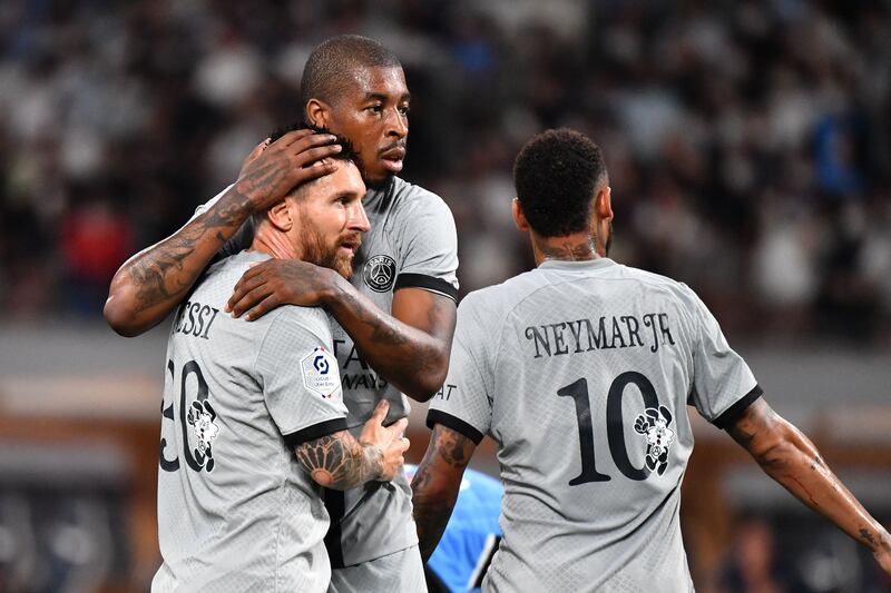 Lionel Messi celebrates his goal with PSG teammates Presnel Kimpembe and Neymar. AFP