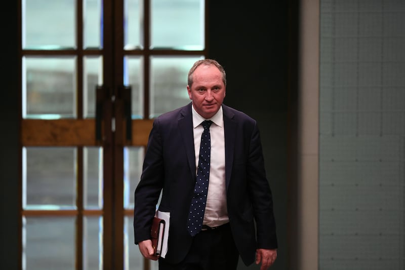 epa06143608 Australian Deputy Prime Minister Barnaby Joyce reacts in the House of Representatives at Parliament House in Canberra, Australian Capital Territory, Australia, 14 August 2017. Deputy Prime Minister Barnaby Joyce has told parliament he may be a citizen of New Zealand. The New Zealand High Commission contacted the Nationals leader on the day to advise he may be a citizen by descent.  EPA/LUKAS COCH  AUSTRALIA AND NEW ZEALAND OUT