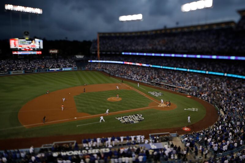 The Los Angeles Dodgers are in action against the Houston Astros during Game 7 of the World Series, with the series locked at 3-3. Matt Slocum / AP Photo