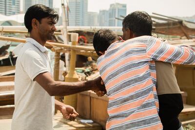 On the day of Ramesh and Ibrahim's depature, their fellow fishermen gathered around to wish them well. Nandini Kochar