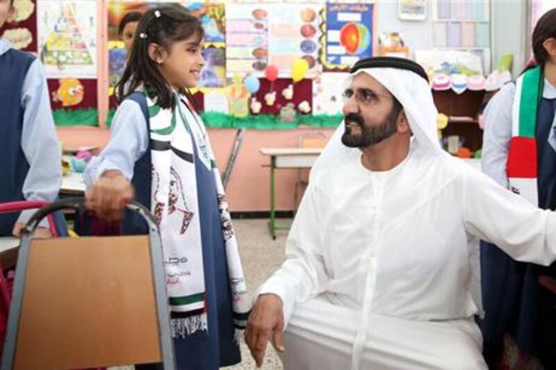 Dubai, 17 Feb. 2013 (WAM) - Vice President, Prime Minister and Ruler of Dubai His Highness Sheikh Mohammed bin Rashid Al Maktoum, today, visited the National Charity Schools in Al Qarhoud, Dubai in response to a wish made by Mira Ali Murad, a student in the 3rd basic class of the school. (The National-WAM Photo) 
