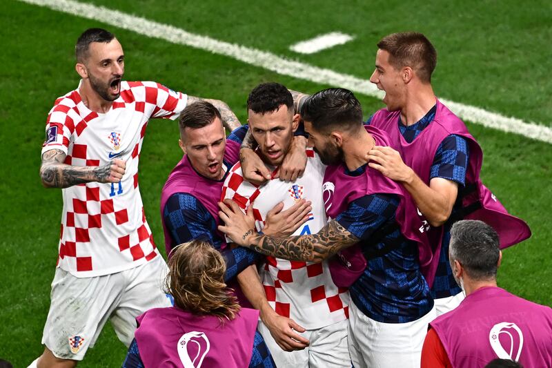Croatia's Ivan Perisic celebrates with teammates after scoring. AFP