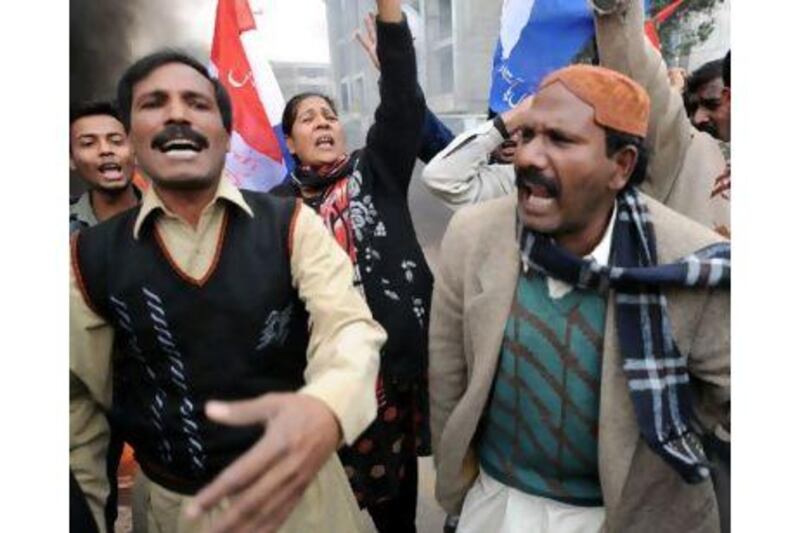 Pakistani Christians shout slogans against the killing of Christian government minister Shahbaz Bhatti in Islamabad.