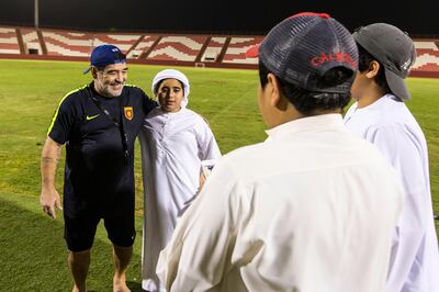Fujairah, United Arab Emirates, July 25, 2017:    Diego Maradona, head coach of Fujairah football club, speaks with local fans after a training session ahead of the UAE first division season at the Fujairah stadium in Fujairah on July 25, 2017. Christopher Pike / The National

Reporter: John McAuley
Section: Sport