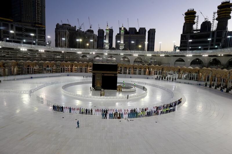 Worshippers perform taraweeh prayer in front of the Kaaba in the Grand Mosque on the first day of Ramadan in Makkah, Saudi Arabia. While the general public are not allowed to enter because of the coronavirus pandemic, imams at Islam’s holiest site still lead the daily prayers with staff and workers. Reuters