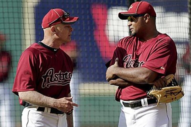 The major league is new territory for Brad Mills, the Houston Astros manager, left.