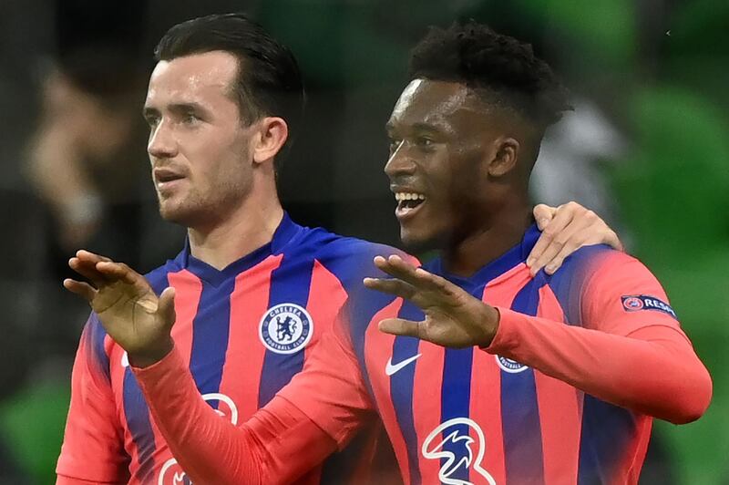 Chelsea's English midfielder Callum Hudson-Odoi celebrates with teammates after scoring the opening goal in the UEFA Champions League match against Krasnodar . AFP