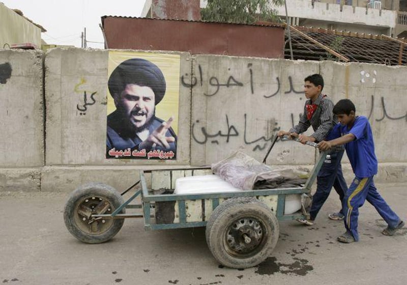 As fast as Iraqi government forces take down posters of Muqtada al Sadr in Baghdad, his loyalists paste them back up.