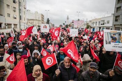 Demonstrators rally against the leadership of Tunisian President Kais Saied on the anniversary of the country's independence, in Tunis. AP