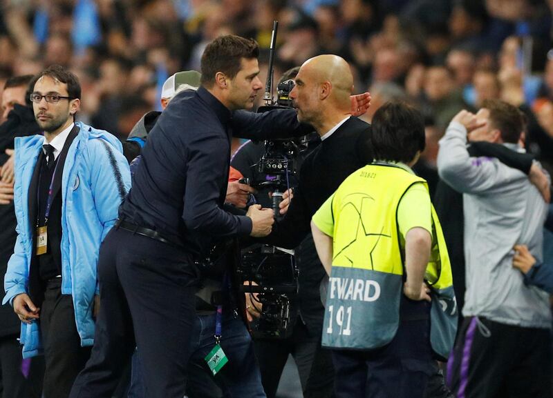 Manchester City manager Pep Guardiola and Tottenham manager Mauricio Pochettino after the match. Reuters