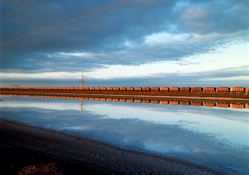 A train on the Rio Tinto-owned Hamersley River railway takes iron ore from the town of Tom Price to Dampier port in Western Australia. Michele Mossop / Fairfax Media via Getty
