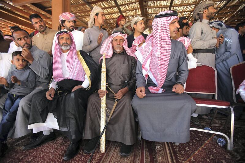 Swords are given to Jordanian Bedouins winners who raced camels using robotic jockeys at the Sheikh Zayed track in the town of al-Disi in the desert of Wadi Rum valley, on November 9, 2019. (The National)