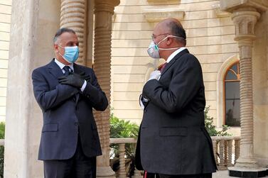 President Barham Salih receiving Prime Minister Mustafa Al Kadhimi at Salam Palace in the capital Baghdad. AFP