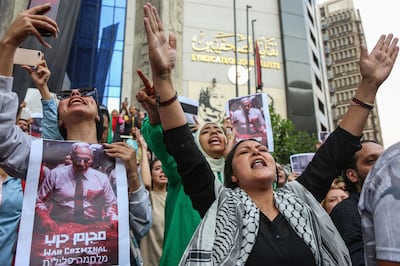 Protesters shout pro-Palestinian and anti-Israel slogans during a rally outside Egypt's Journalists' Union in central Cairo on Wednesday. Bloomberg