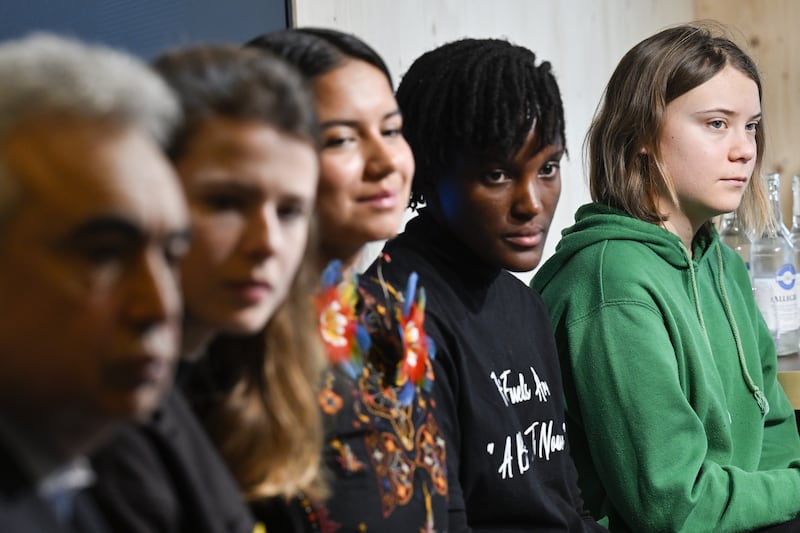 Climate activists Greta Thunberg of Sweden, Vanessa Nakate of Uganda, Helena Gualinga of Ecuador, Luise Neubauer of Germany, and Fatih Birol, Head of the International Energy Agency, attend to a press conference on the set of CNBC, on the sideline of the World Economic Forum, WEF, in Davos. EPA