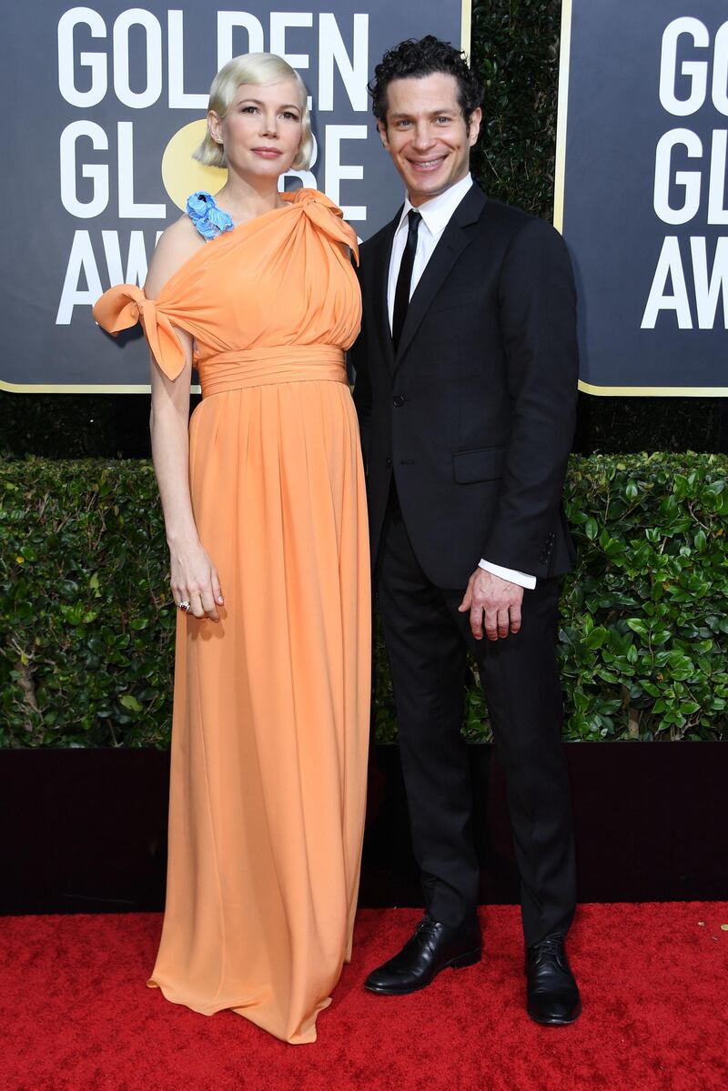 Michelle Williams and Thomas Kail arrive for the 77th annual Golden Globe Awards. AFP