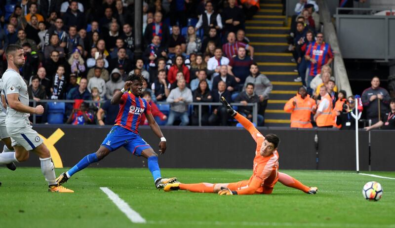 Soccer Football - Premier League - Crystal Palace vs Chelsea - Selhurst Park, London, Britain - October 14, 2017   Crystal Palace's Wilfried Zaha scores their second goal    Action Images via Reuters/Tony O'Brien    EDITORIAL USE ONLY. No use with unauthorized audio, video, data, fixture lists, club/league logos or "live" services. Online in-match use limited to 75 images, no video emulation. No use in betting, games or single club/league/player publications. Please contact your account representative for further details.