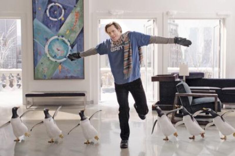 In this publicity image released by 20th Century Fox, Jim Carrey is shown in a scene from "Mr. Popper's Penguins." (AP Photo/20th Century Fox, Barry Wetcher) *** Local Caption ***  NYET928_Film_Review_Mr_Poppers_Penguins.jpg