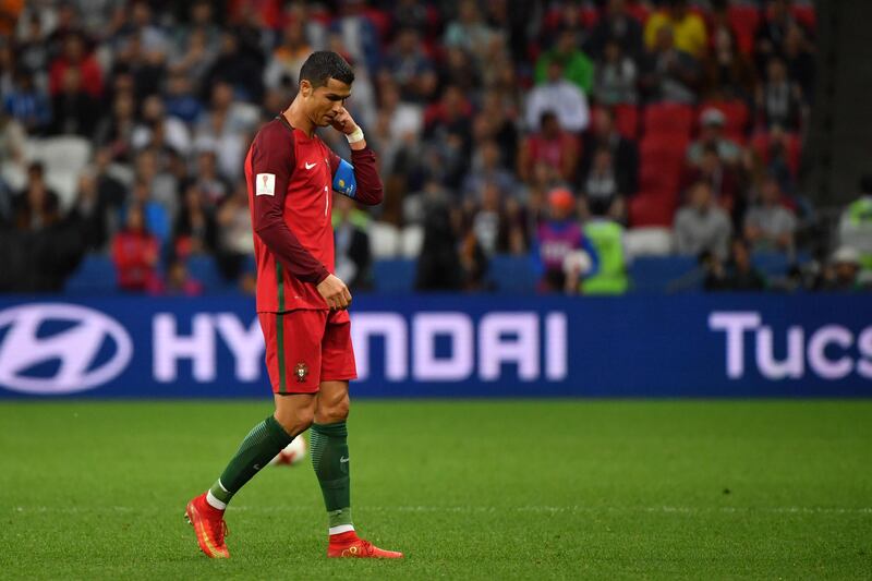 Portugal international Cristiano Ronaldo will continue to play for Spanish club Real Madrid even as he responds to charges on tax evasion. Yuri Cortez / AFP