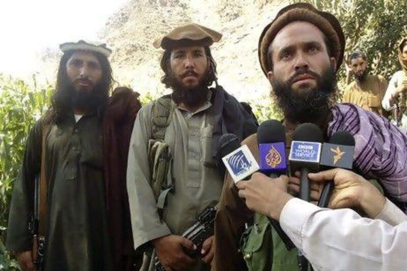 Pakistani Taliban group commander Mullah Dadullah (right), who was killed along with 11 others including his deputy in an airstrike in Afghanistan’s Kunar region on Friday.