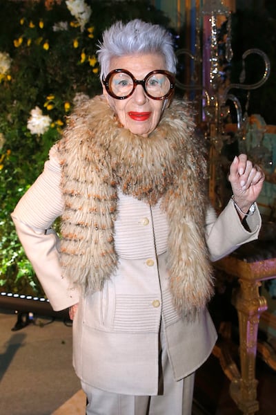 In safari suit and stole, and her famous round glasses, Iris Apfel at the age of 94. Getty Images