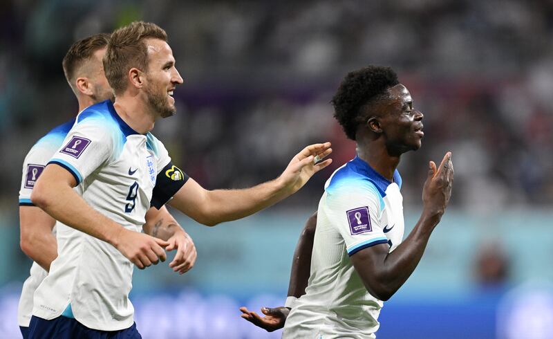 Bukayo Saka celebrates after scoring England's fourth goal just after the hour. Gett