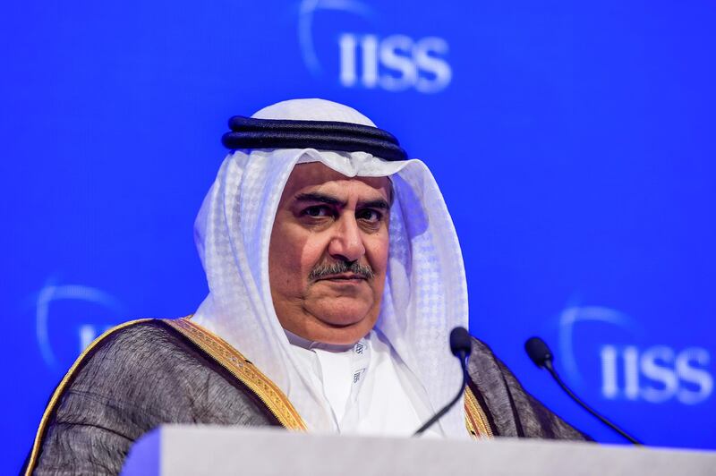 (FILES) In this file photo taken on October 27, 2018 Bahrain's Foreign Minister Khalid bin Ahmed al-Khalifa addresses the 14th International Institute for Strategic Studies (IISS) Manama Dialogue in the Bahraini capital Manama. - khalifa has said Israel is part of the region's heritage and the Jewish people have "a place amongst us" in a rare interview of an Arab official by an Israeli journalist. The interview -- on the sidelines of the US-organised economic conference in Bahrain, intended to kickstart the White House's Middle East peace plan -- was broadcast late on June 26, 2019 on Israel's Channel 13 television. (Photo by - / AFP)