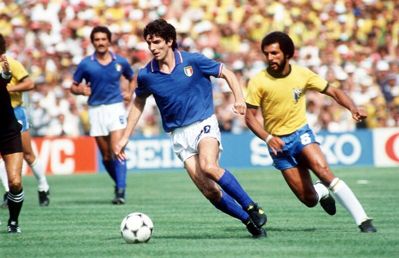 Football - 1982 FIFA World Cup - Second Phase Group 4 - Italy v Brazil - Estadio Sarria, Barcelona - 5/7/82 
Italy's Paolo Rossi gets away from Brazil's Junior 
Mandatory Credit: Action Images / MSI