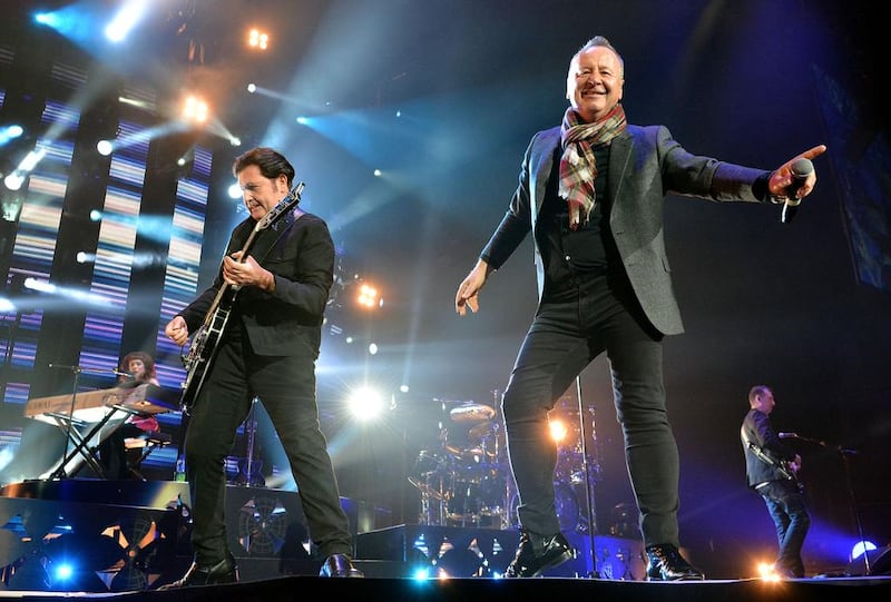 Charlie Burchill, left, and Jim Kerr of Simple Minds perform at the O2 Arena in London last November. Jim Dyson / Getty Images 