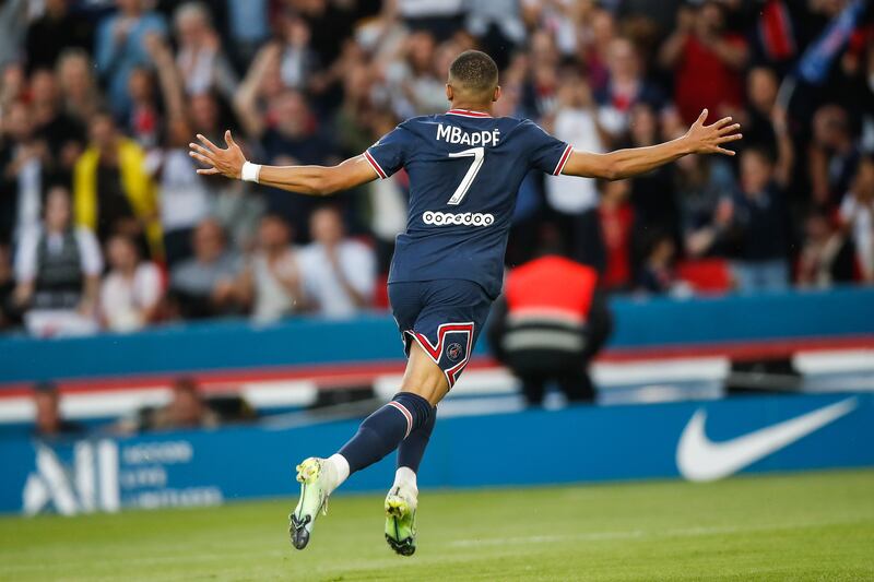 Kylian Mbappe celebrates after scoring his first goal against Metz at the Parc des Princes. EPA