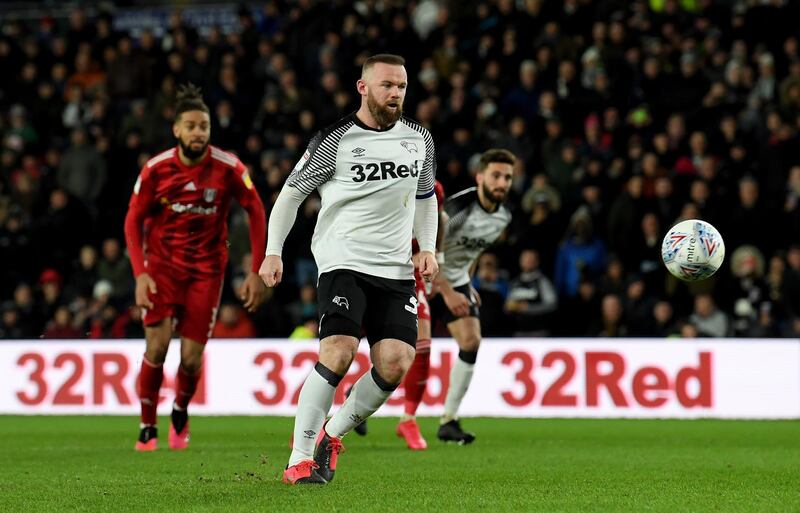 Wayne Rooney scores a 'Panenka' penalty against Fulham. Getty